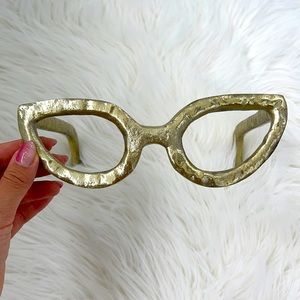 Home decor gold-colored glasses for display